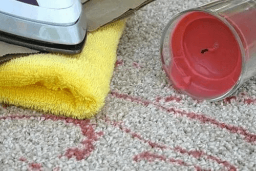 Melted wax on carpet